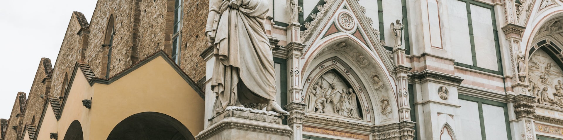 Basilica of Santa Croce which includes heritage elements, heritage architecture and a statue or sculpture