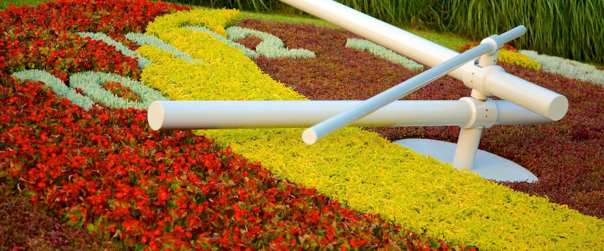 Flower Clock showing outdoor art and flowers