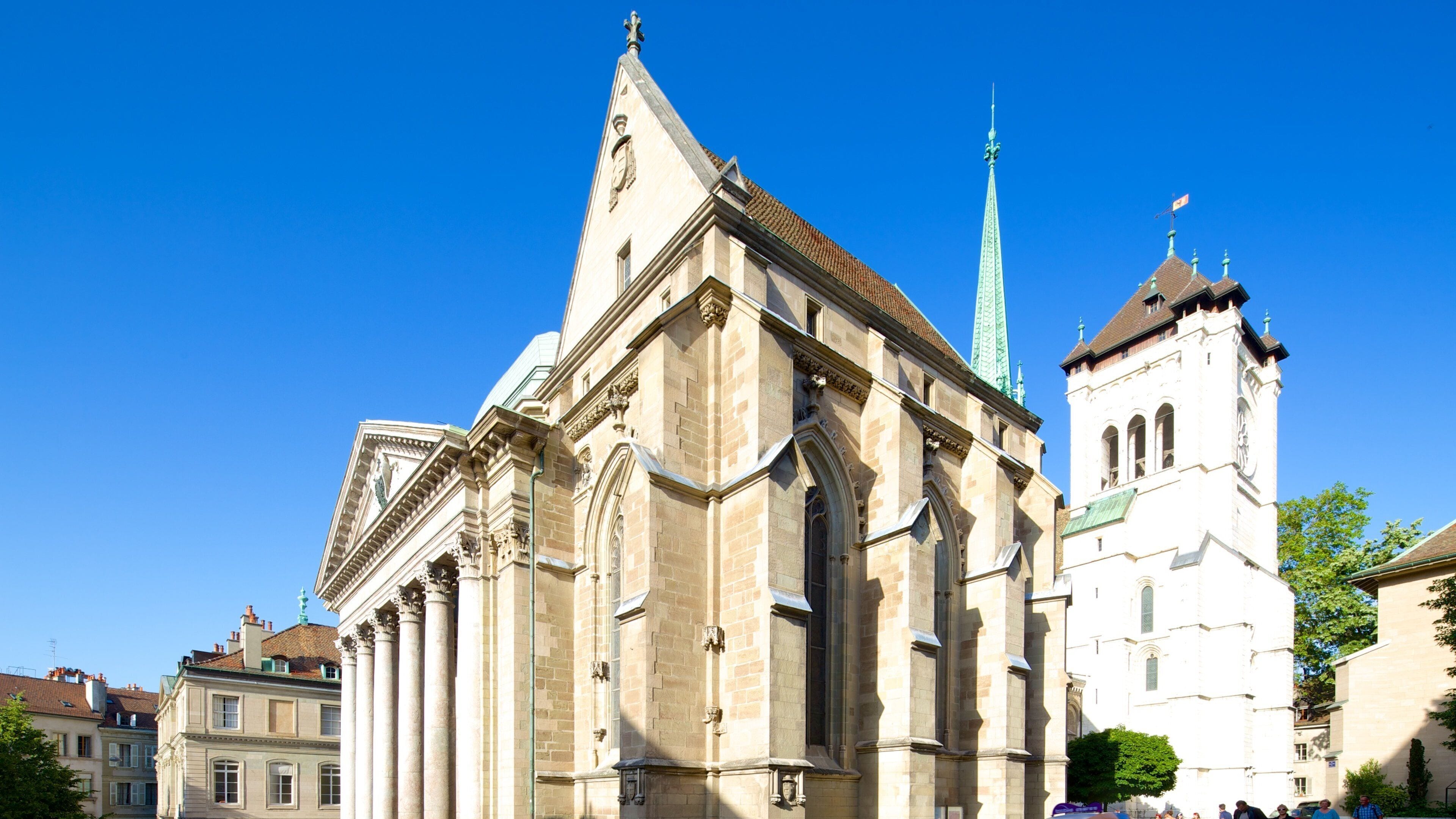 A historic church with a tall spire and a clock tower.
