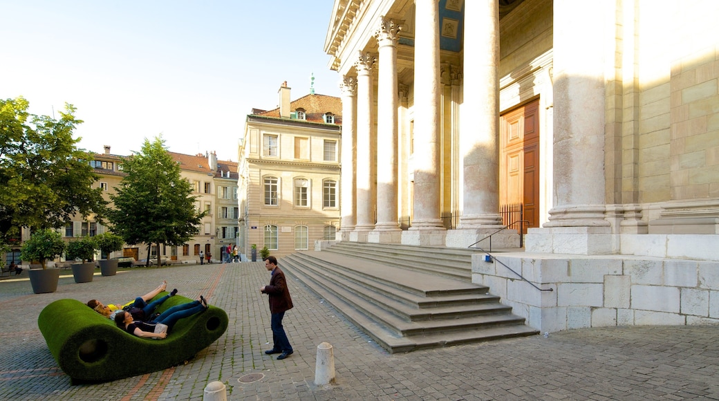 Saint-Pierre Cathedral featuring street scenes as well as a small group of people
