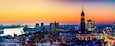 Panoramic aerial view of the harbor, St. Michael's Church (German: St. Michaelis) and downtown Hamburg, Germany.