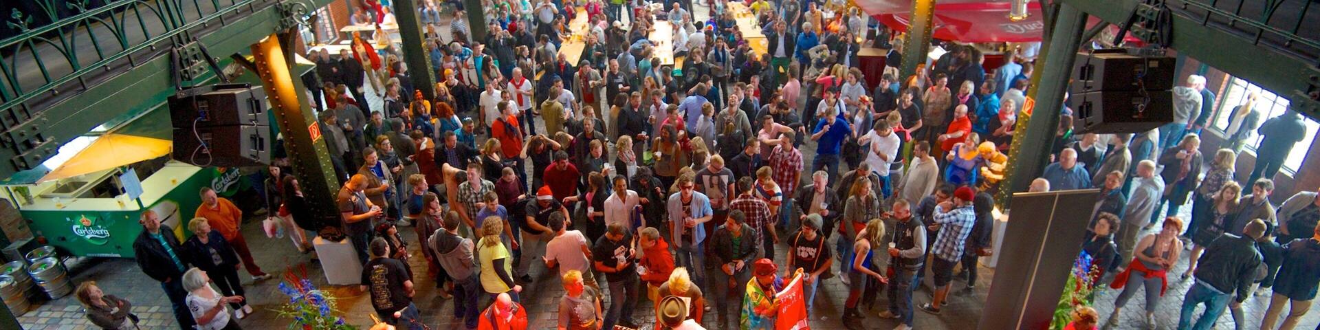 Fish Market showing performance art, markets and interior views