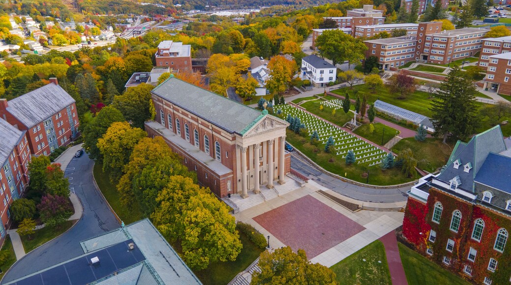 Aerial view of St. Joseph's Chapel in College of the Holy Cross with fall foliage in city of Worcester, Massachusetts MA, USA.