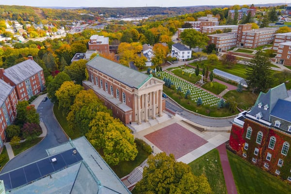 Aerial view of St. Joseph's Chapel in College of the Holy Cross with fall foliage in city of Worcester, Massachusetts MA, USA.