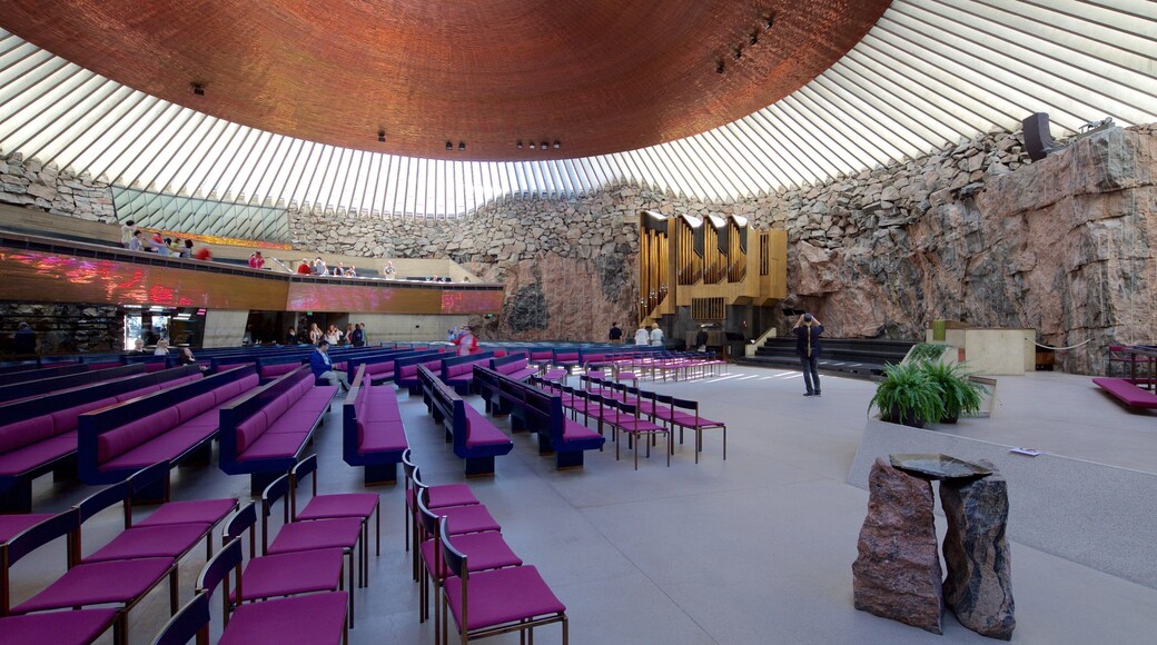Temppeliaukio Church which includes a church or cathedral and interior views