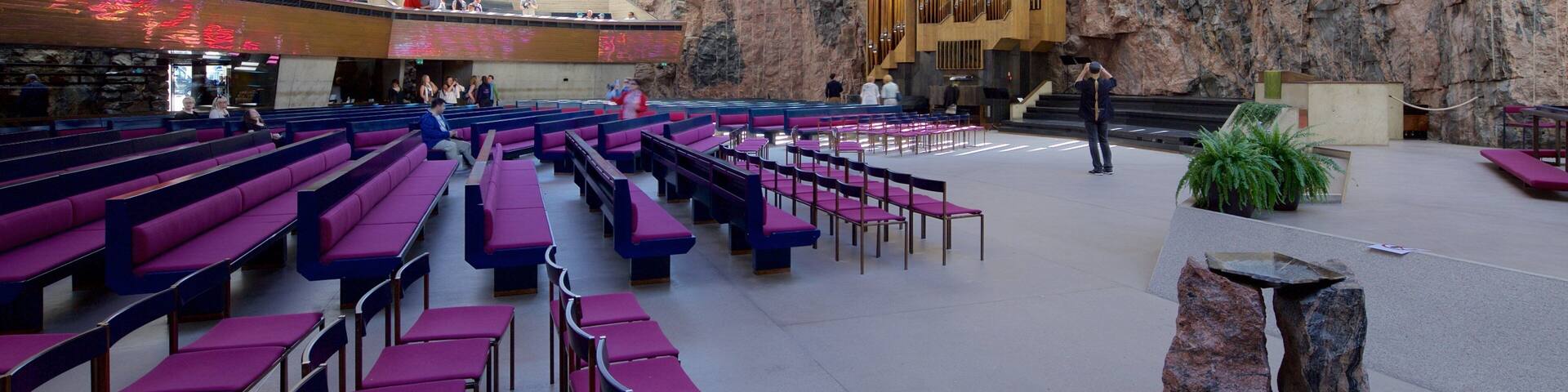 Temppeliaukio Church featuring interior views and a church or cathedral