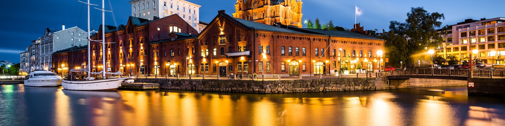 View of the island of Katajanokka and Uspenski Cathedral at night, in Helsinki, Finland.
