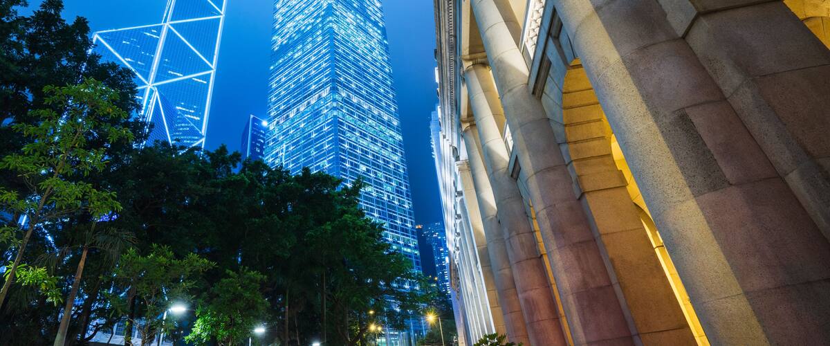 Cheung Kong Center and Bank of China Tower in central Hong Kong at night,blue toned.; Shutterstock ID 1036626331; purchase_order: SF 06557000; job: ; client: ; other: