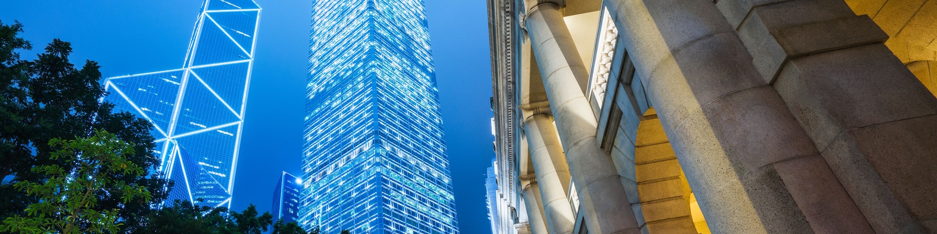 Cheung Kong Center and Bank of China Tower in central Hong Kong at night,blue toned.; Shutterstock ID 1036626331; purchase_order: SF 06557000; job: ; client: ; other: