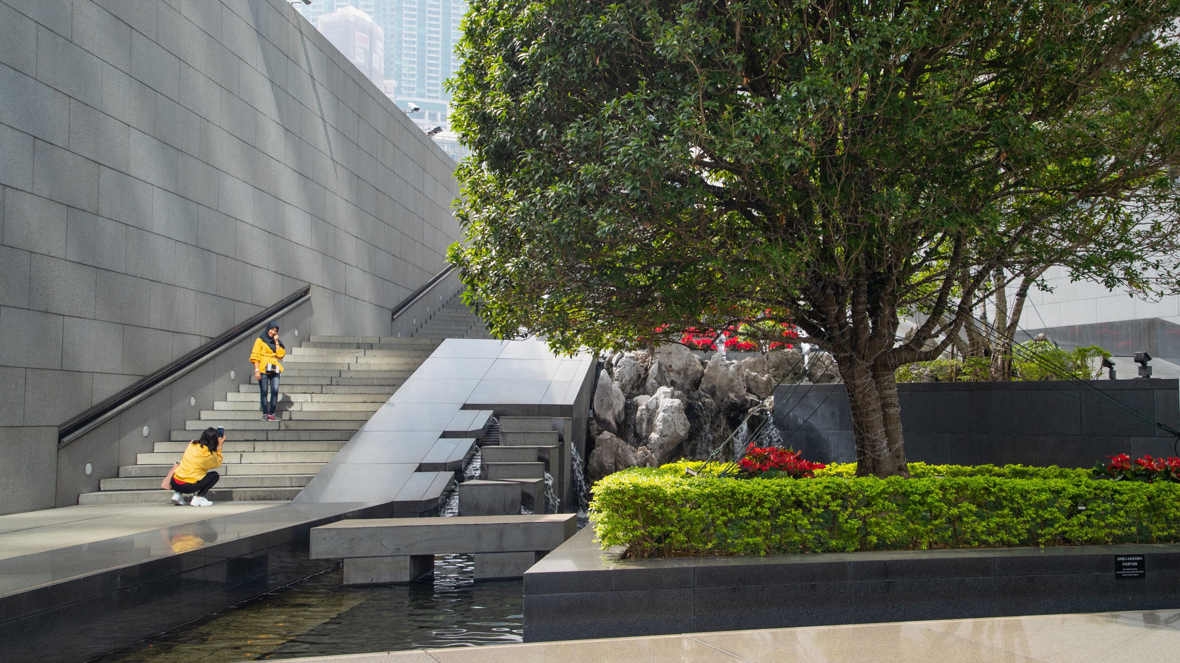 Bank of China Tower featuring a park and a river or creek