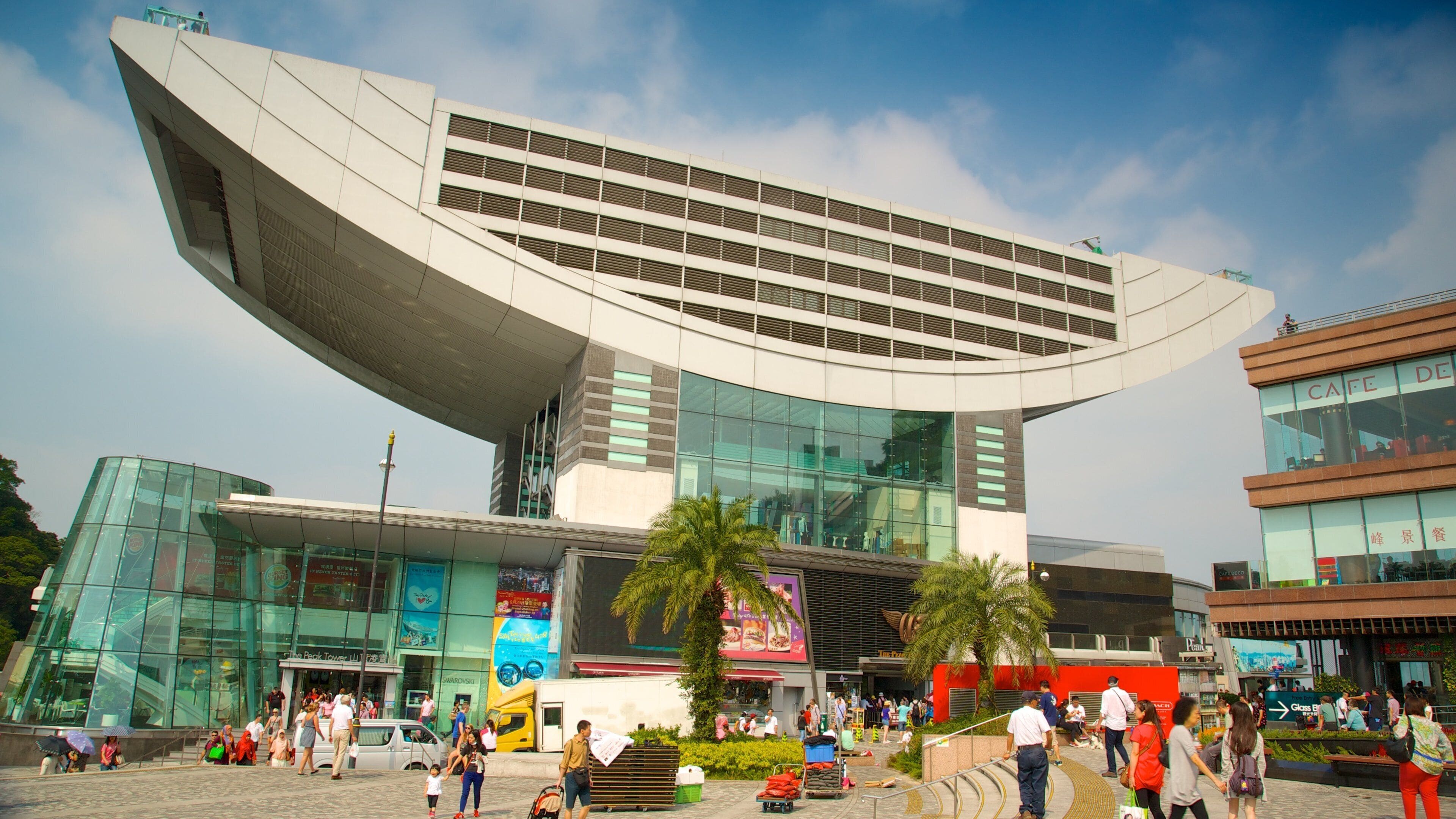 Victoria Peak Tower featuring modern architecture and a city