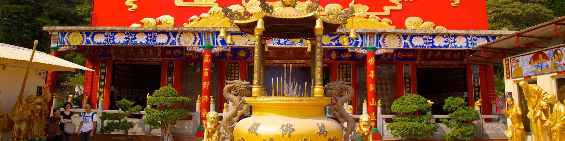 Ten Thousand Buddhas Monastery which includes a temple or place of worship and religious aspects