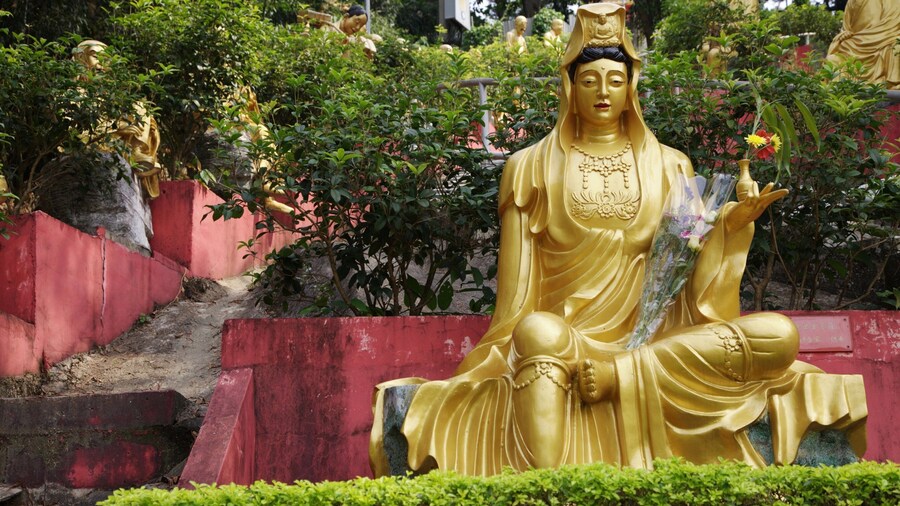 Ten Thousand Buddhas Monastery featuring a statue or sculpture and religious aspects