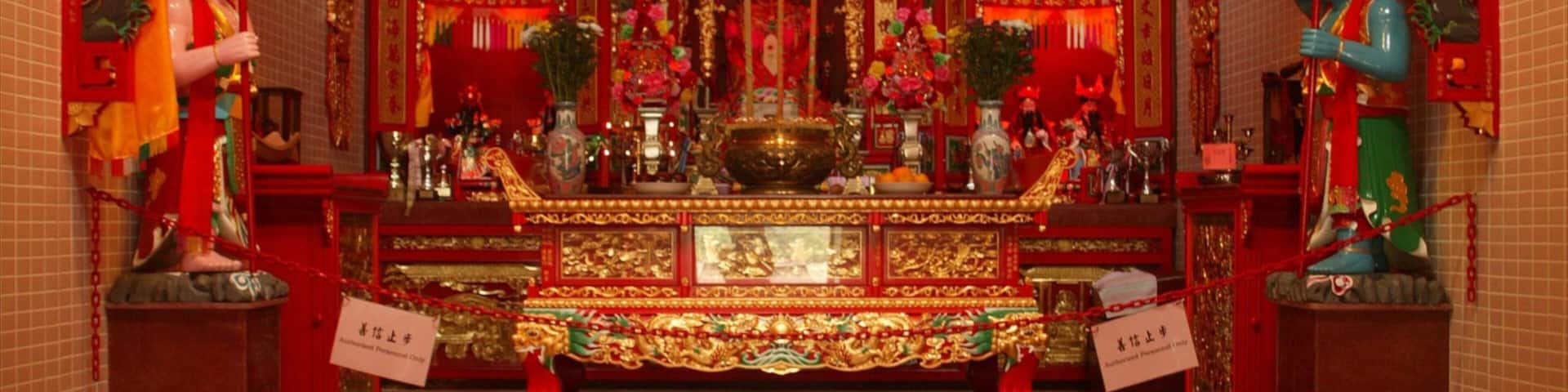 Tin Hau Temple featuring interior views, a temple or place of worship and religious elements