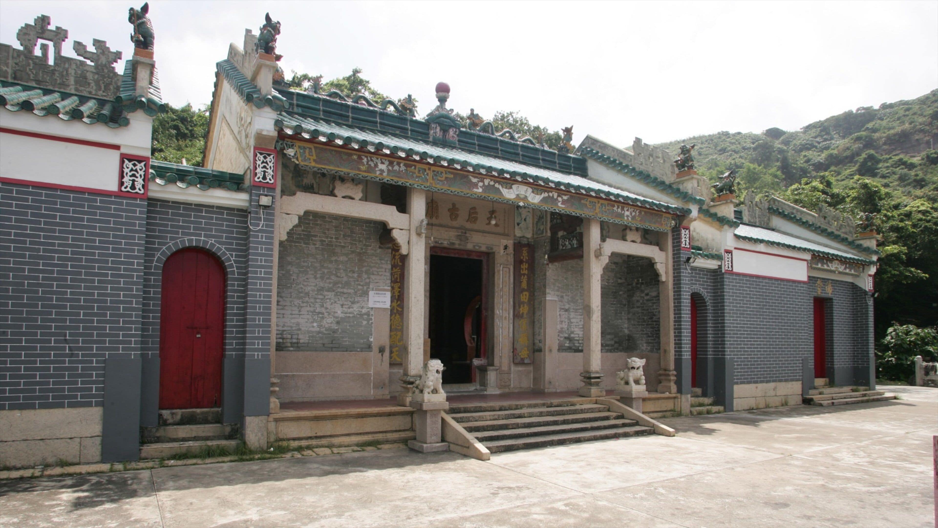 Tin Hau Temple featuring a temple or place of worship and street scenes