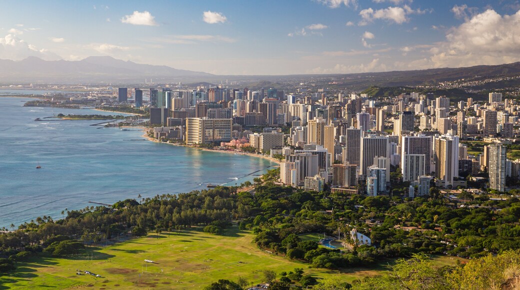 Diamond Head showing a sunset, a coastal town and landscape views