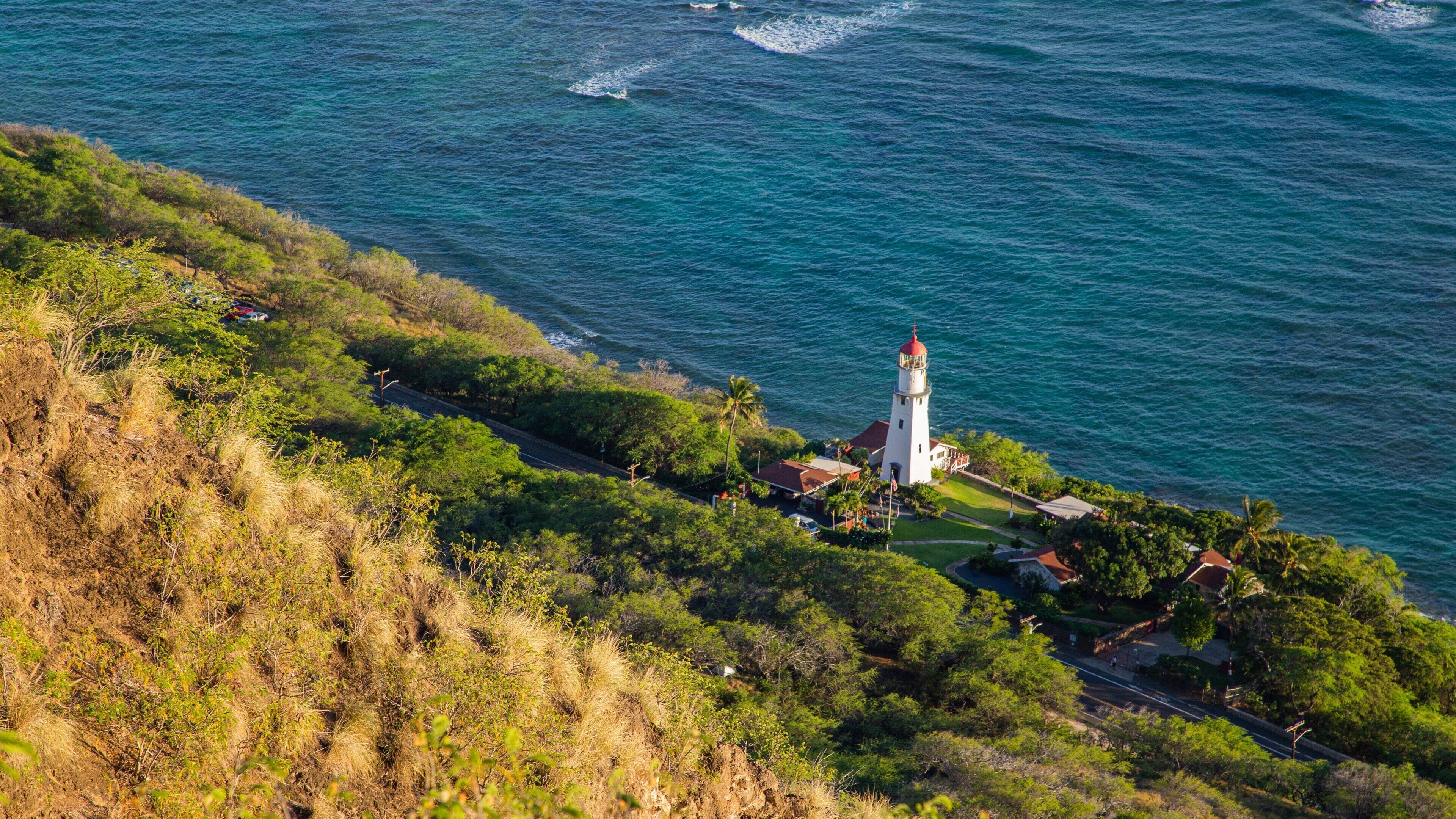 Diamond Head featuring general coastal views and a lighthouse