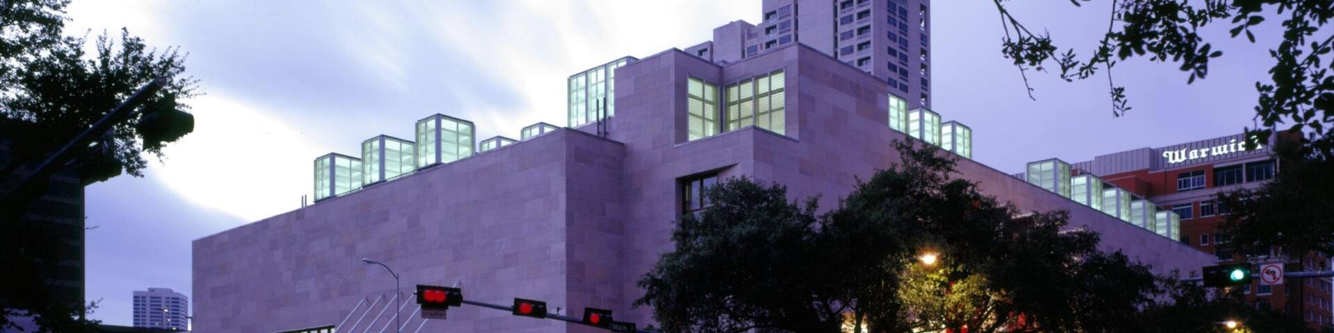 Houston Museum of Fine Arts showcases modern architecture in urban setting at dusk