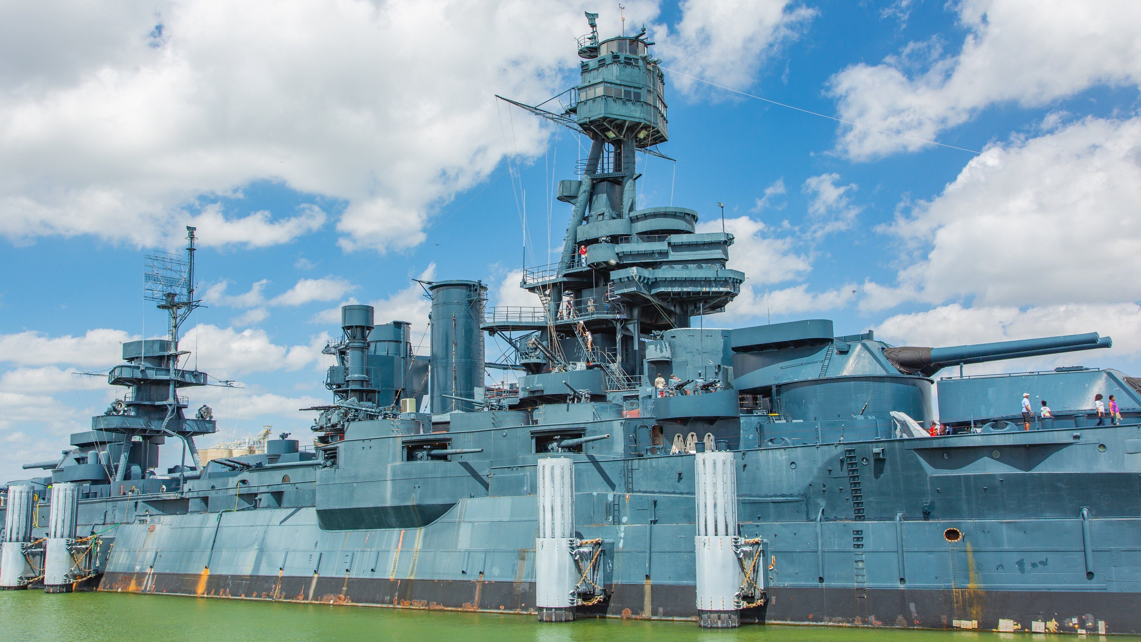 Battleship Texas featuring military items and a marina