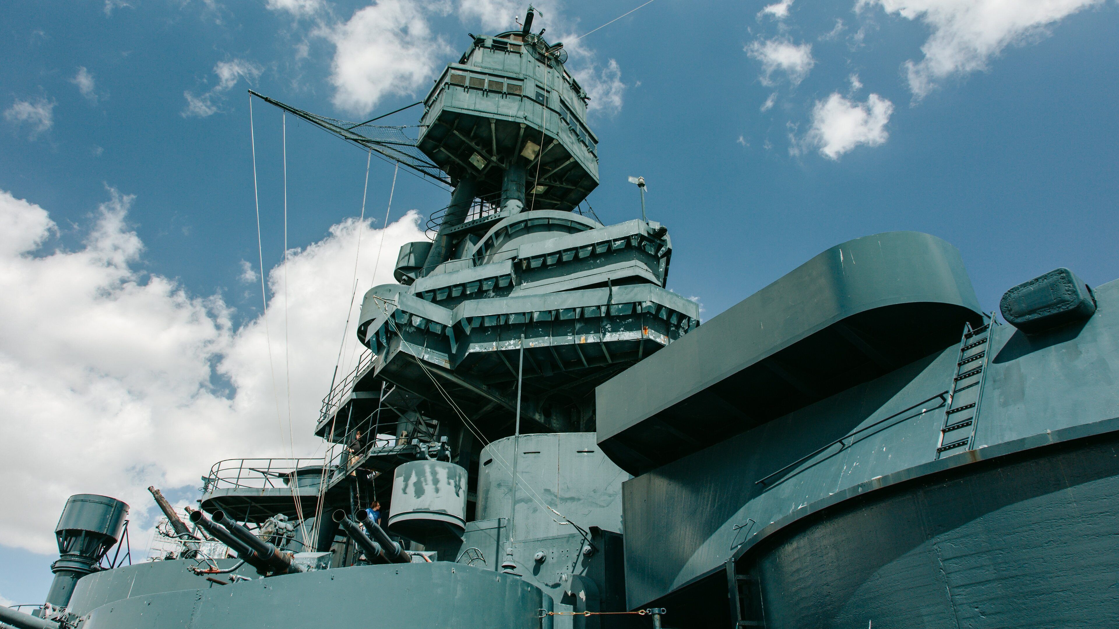 Battleship Texas showing military items and a marina