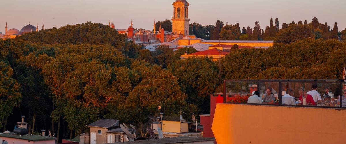 Topkapi Palace featuring outdoor eating, landscape views and a sunset