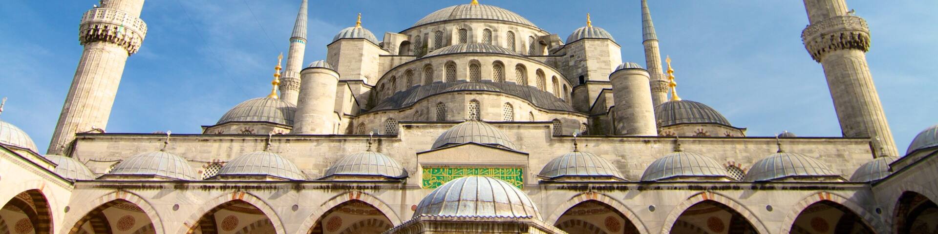 A mosque with multiple domes and minarets.