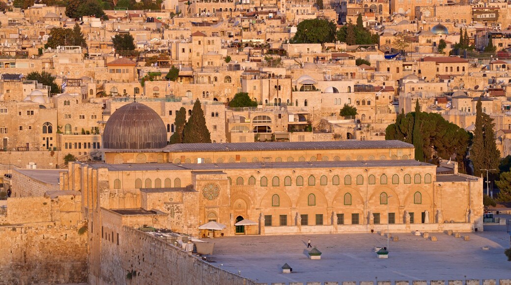 Al-Aqsa Mosque which includes landscape views, heritage elements and a sunset