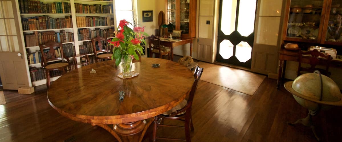 Grove Farm Homestead which includes flowers and interior views