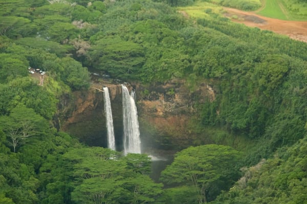Wailua Falls featuring a cascade and forest scenes