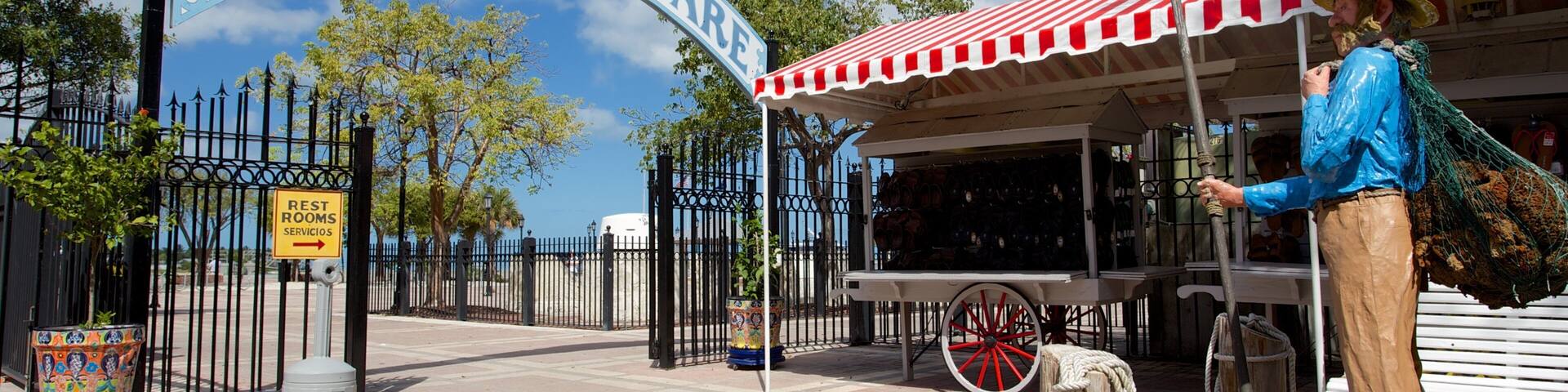 Mallory Square featuring outdoor art, a square or plaza and signage