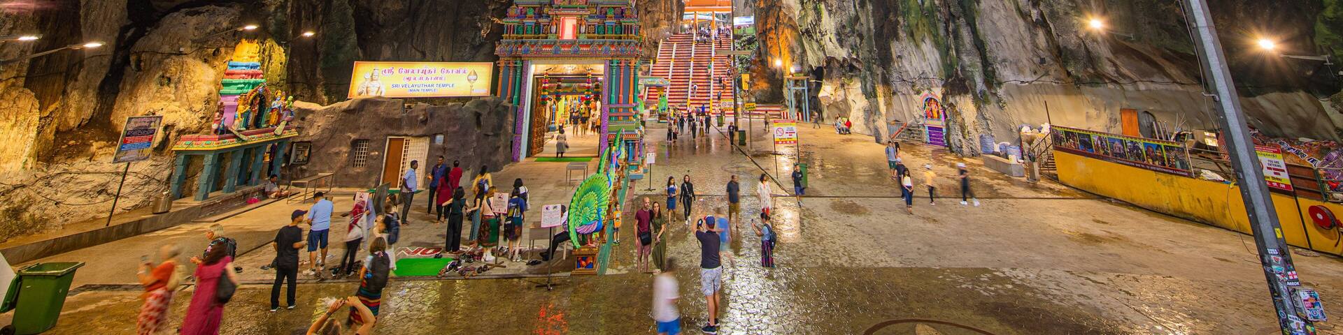 Batu Caves which includes caves as well as a large group of people