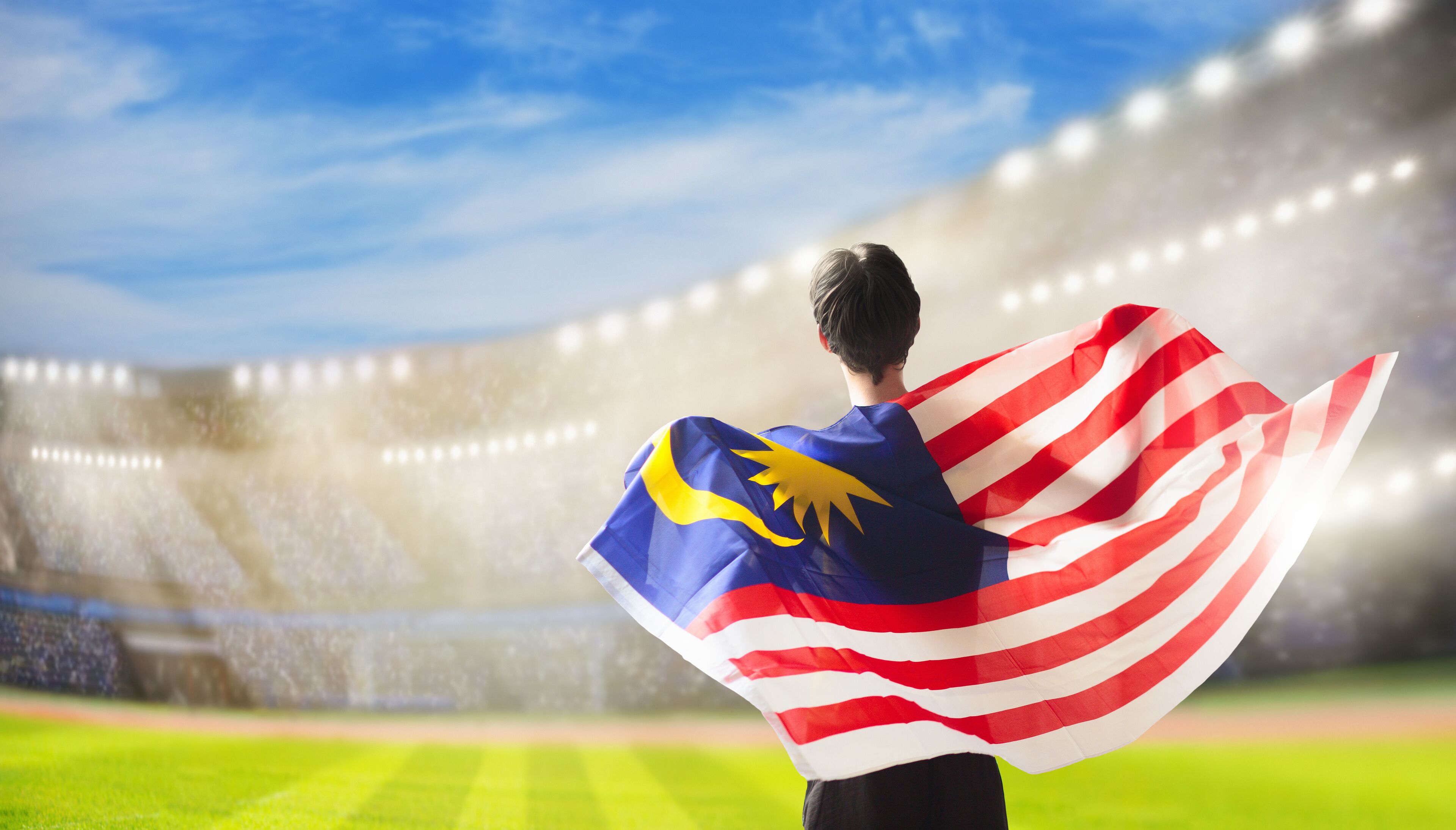 Malaysia football team supporter on stadium.