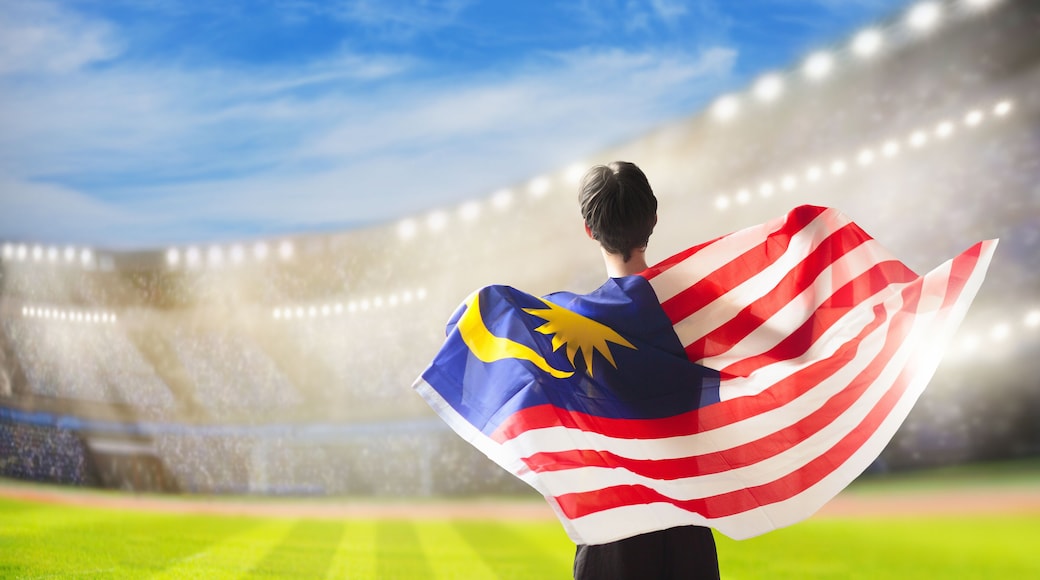 Malaysia football team supporter on stadium.