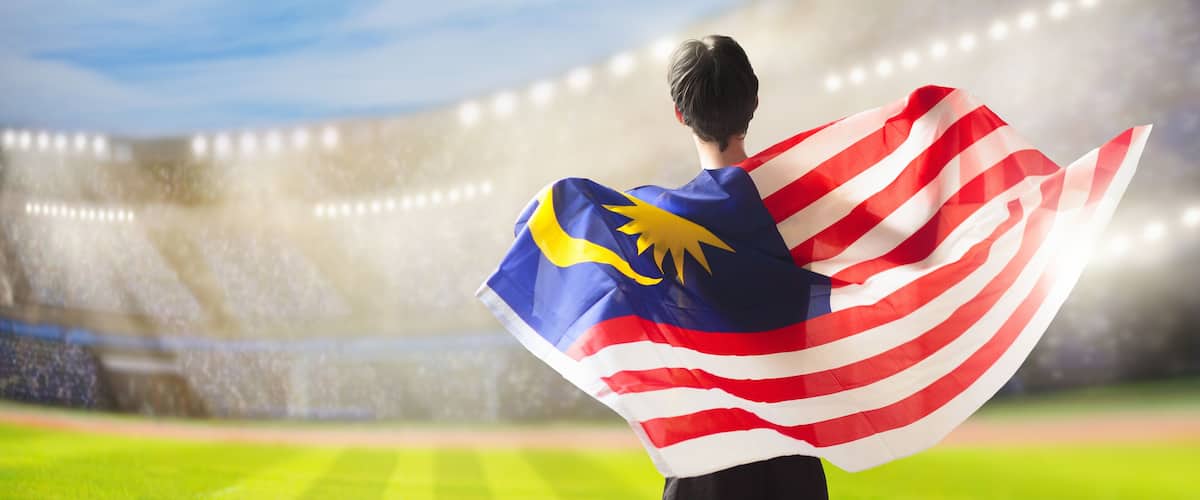 Malaysia football team supporter on stadium.