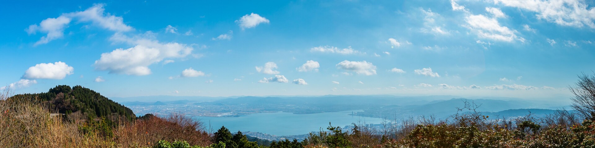 Beautiful Panorama landscape southern west side of lake Biwa (Biwako) and cityscape of Otsu-shi from a mountain top of Hieizan (Mt. Hiei), Shiga, Japan.