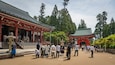 Enryakuji Temple featuring heritage elements and a temple or place of worship as well as a small group of people
