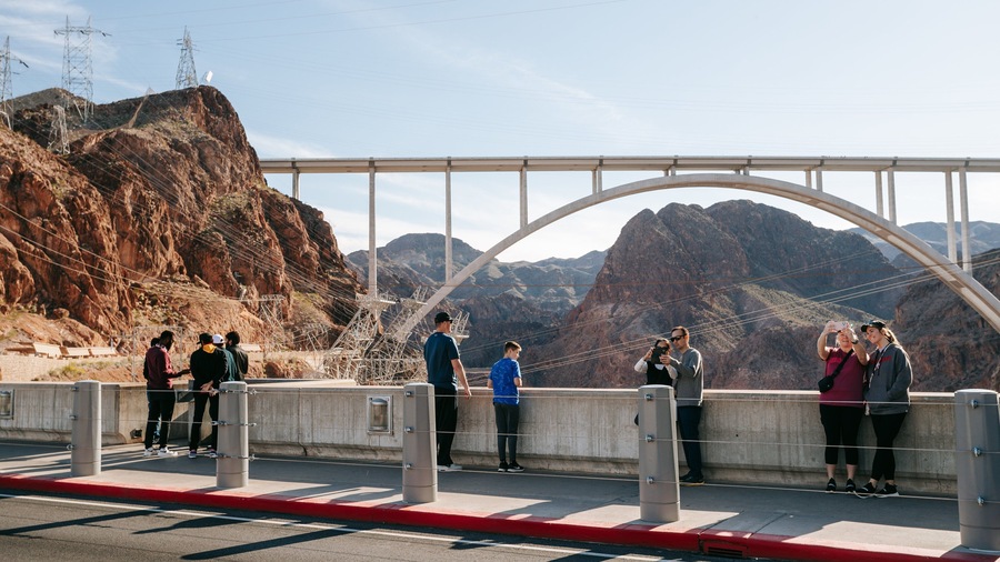 Hoover Dam showing a gorge or canyon, a bridge and views