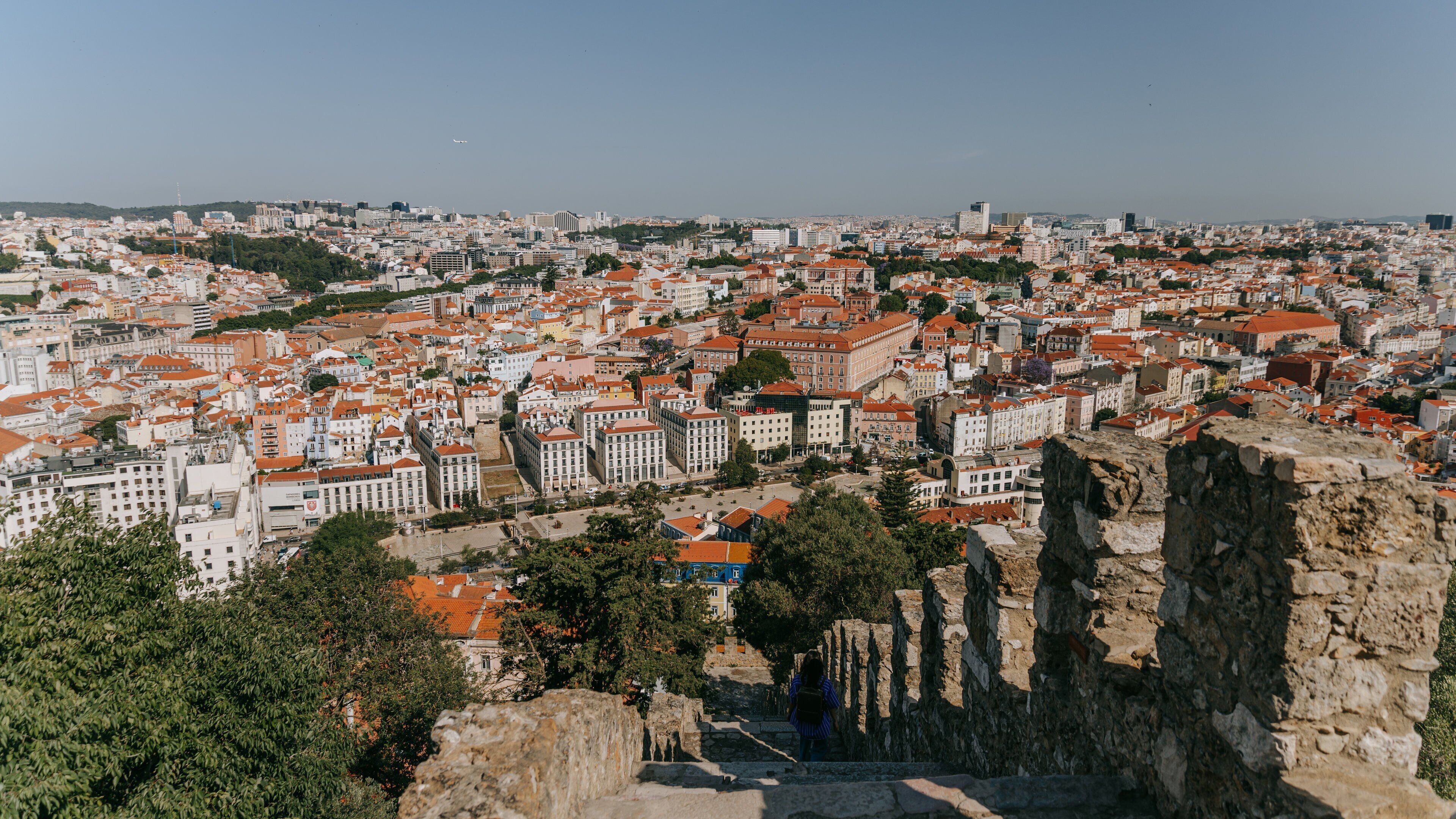 Castle of São Jorge featuring a city and landscape views