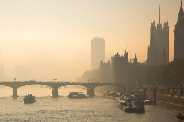 Houses of Parliament which includes a city, a sunset and a marina
