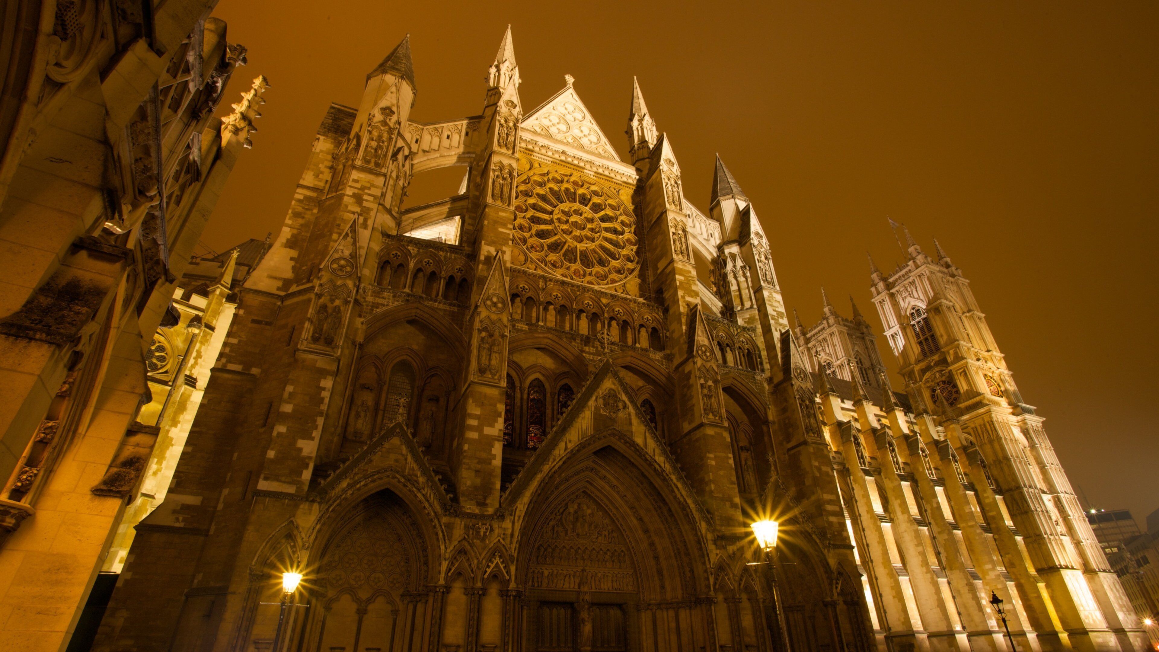 Westminster Abbey illuminated at night with stunning gothic architecture in London, England
