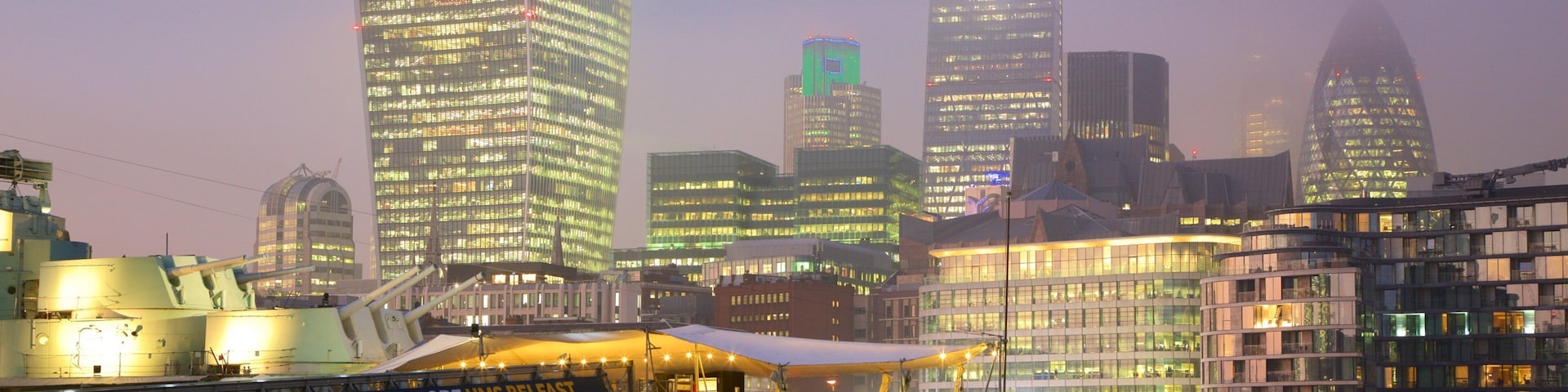 HMS Belfast showing skyline, night scenes and mist or fog