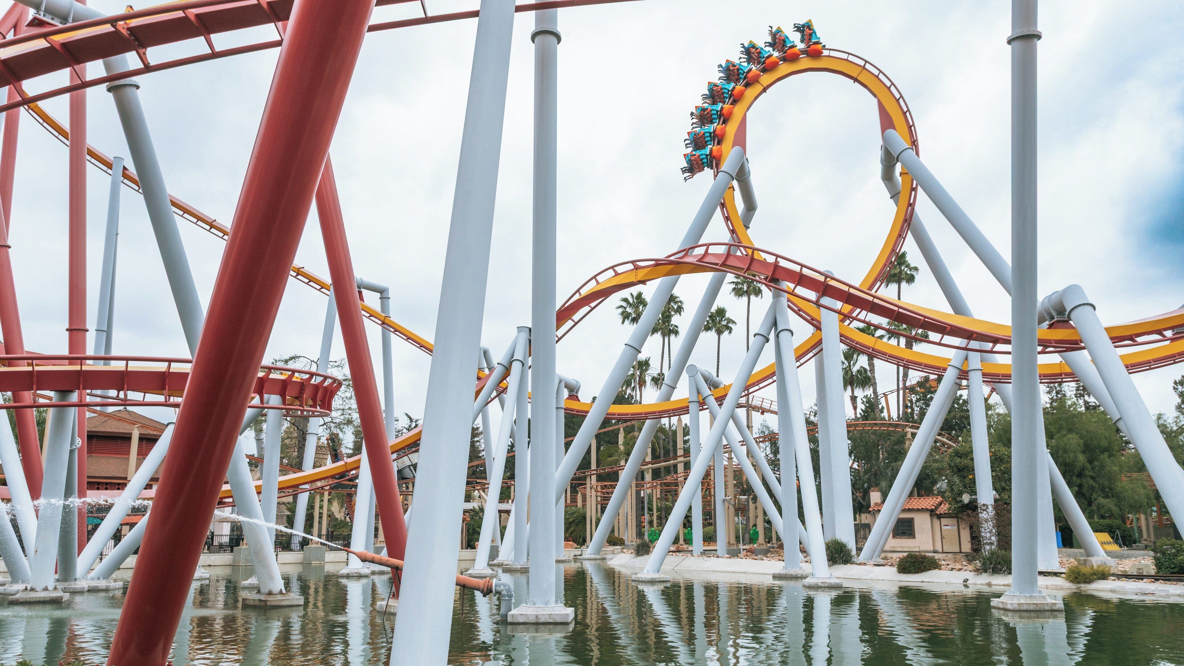 Experience the thrill of roller coasters at Knott's Berry Farm in Buena Park, California during a sunny afternoon