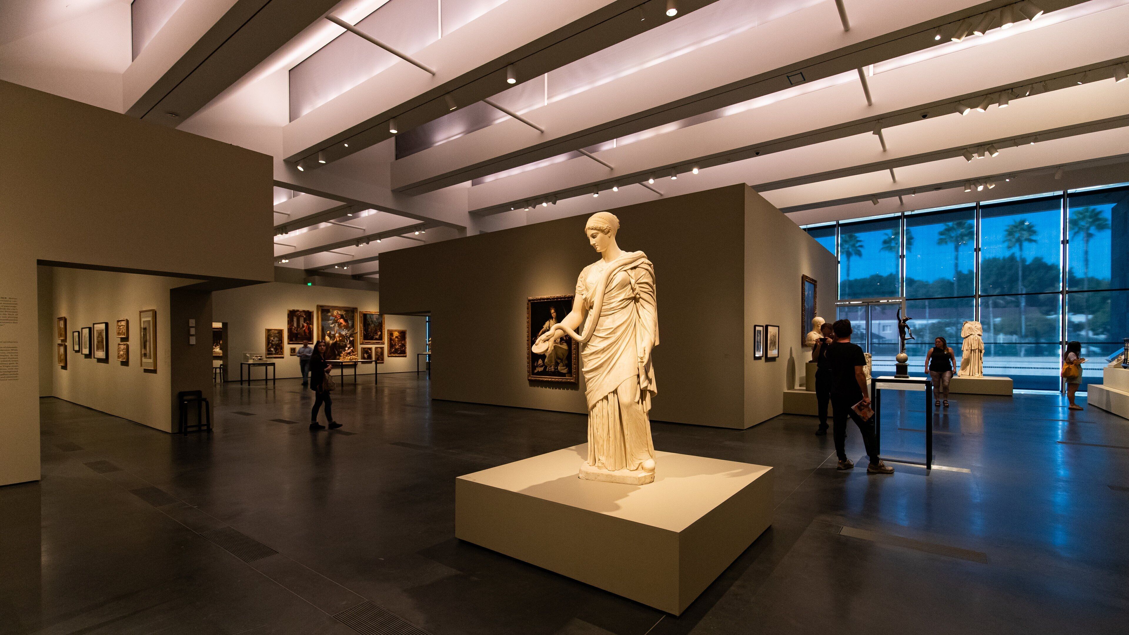 Los Angeles County Museum of Art featuring interior views, art and a statue or sculpture