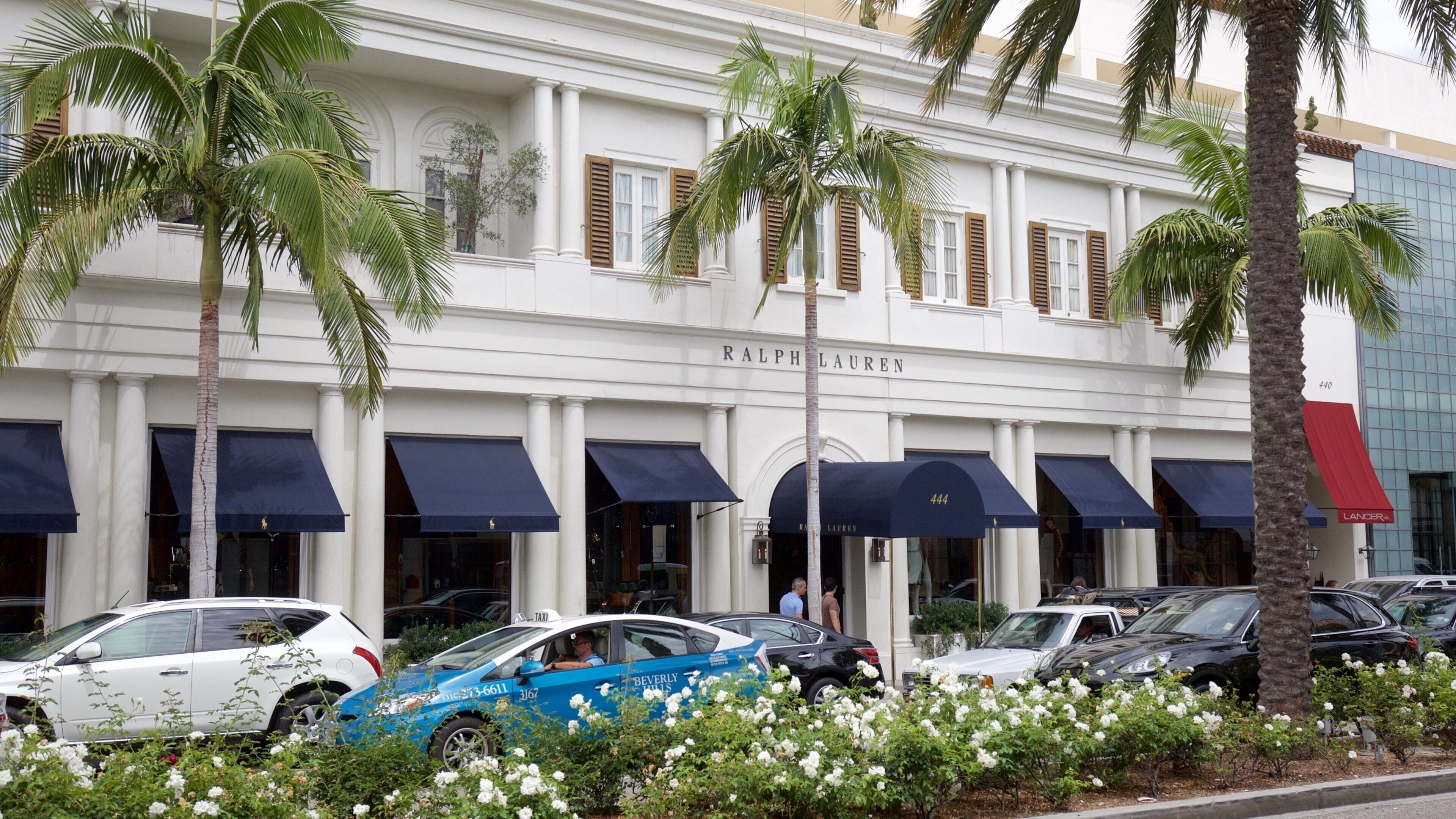 Rodeo Drive som inkluderer gatescener, mote og skilt