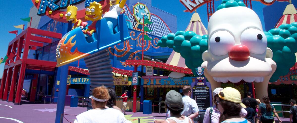 The Simpsons Ride and Krustyland at a theme park.