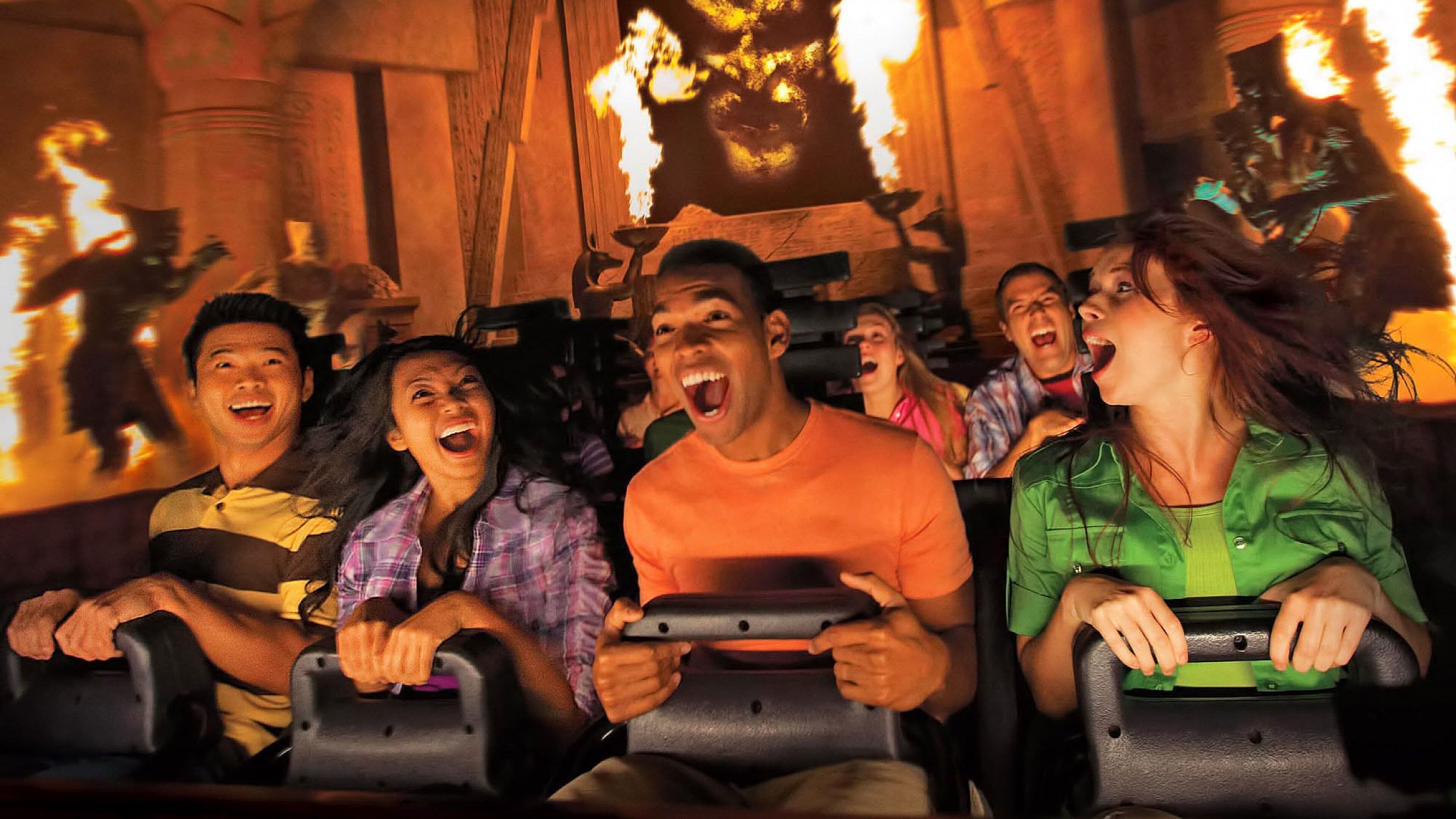 Universal Studios Hollywood featuring rides as well as a small group of people