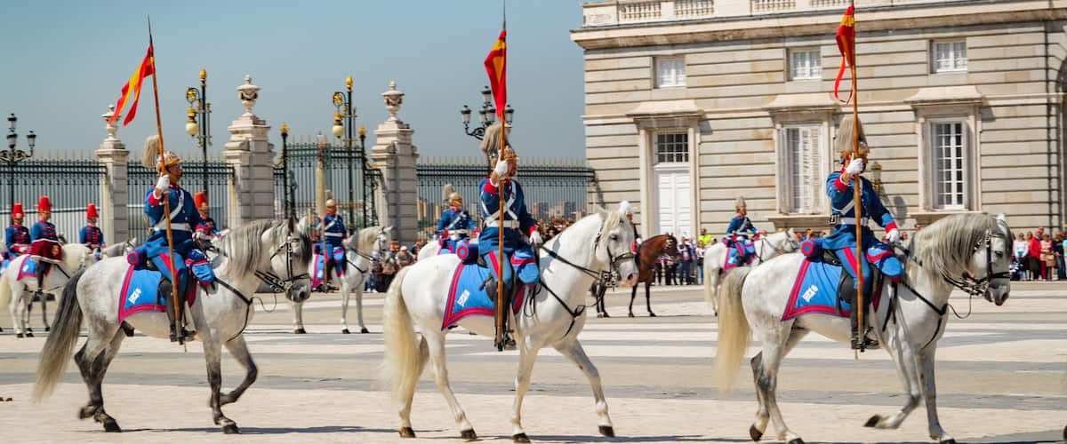 Royal Palace which includes a square or plaza, horseriding and performance art