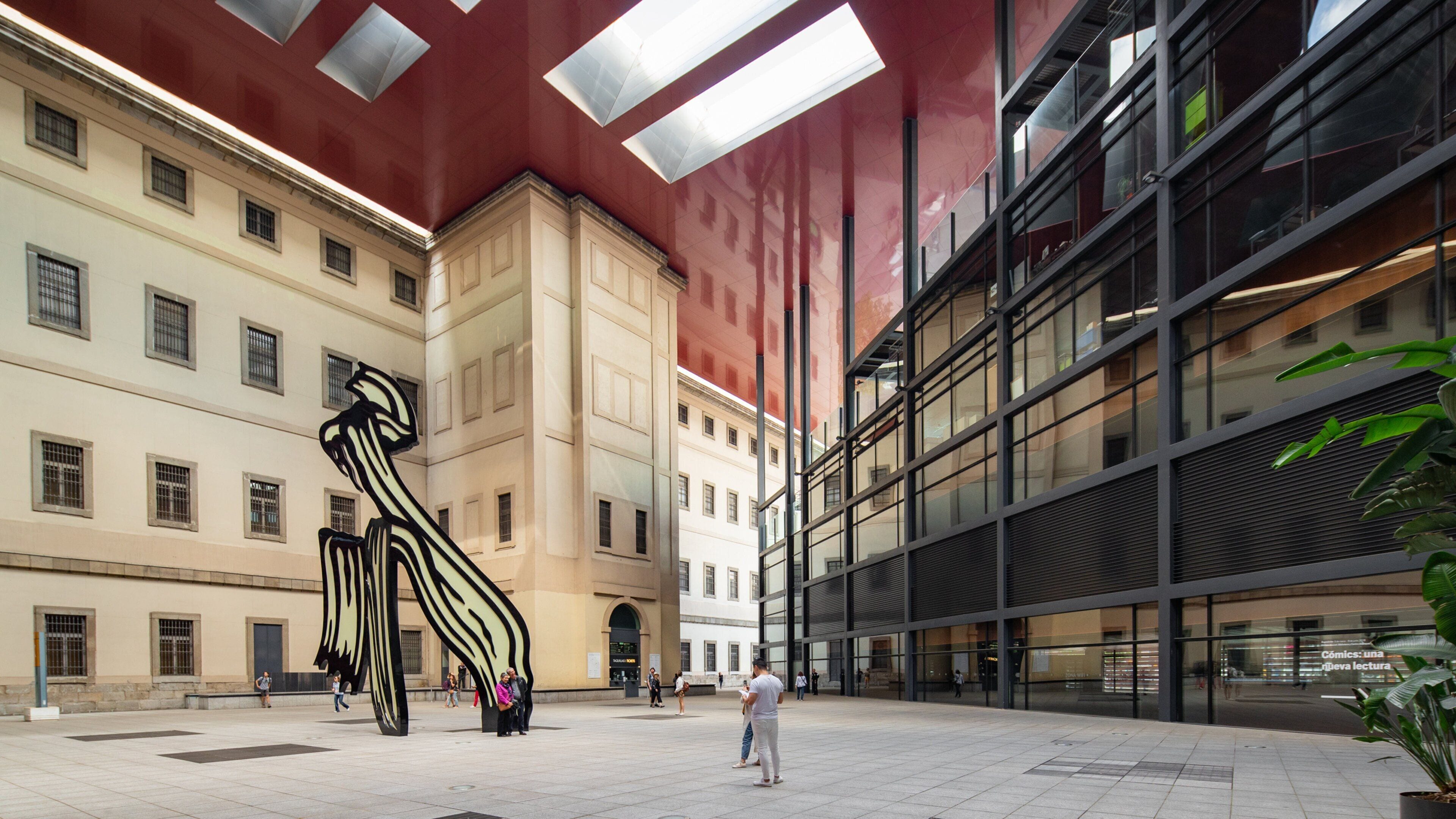 Reina Sofia Museum featuring a square or plaza and outdoor art