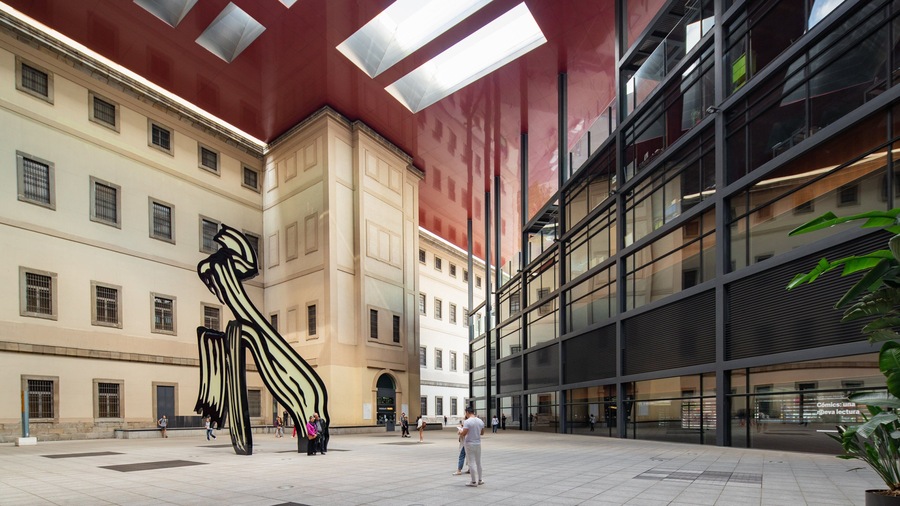 Reina Sofia Museum featuring a square or plaza and outdoor art