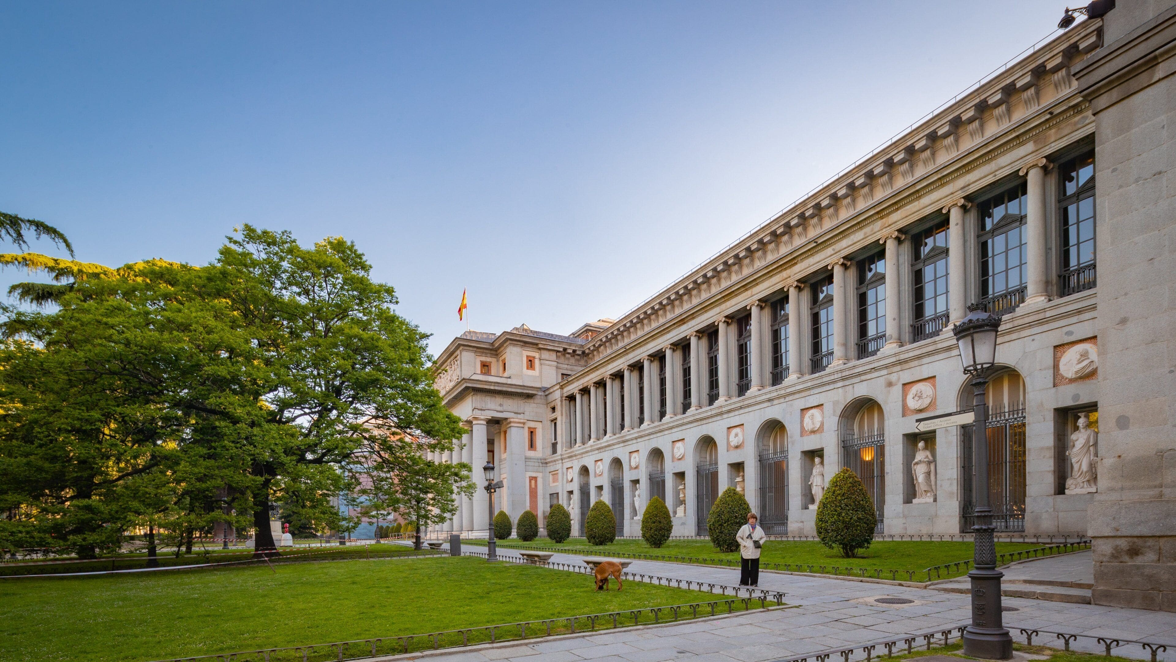 Prado Museum featuring a garden and heritage architecture